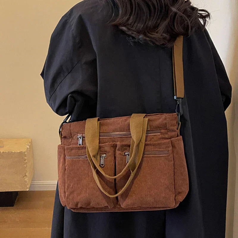 Sac à main femme double fermeture zippée compartiments spacieux élégant