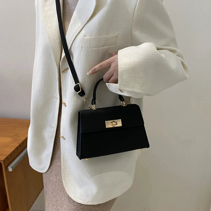 Sac satchel femme structuré fermoir twist-lock bandoulière amovible