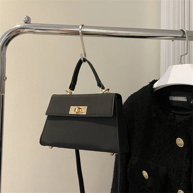Sac satchel femme structuré fermoir twist-lock bandoulière amovible
