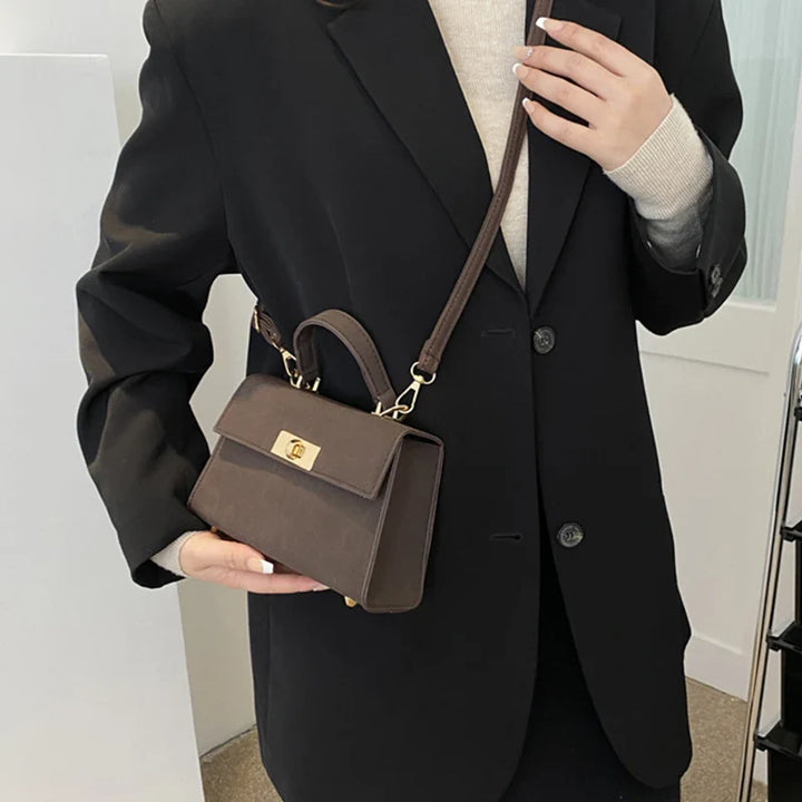 Sac satchel femme structuré fermoir twist-lock bandoulière amovible