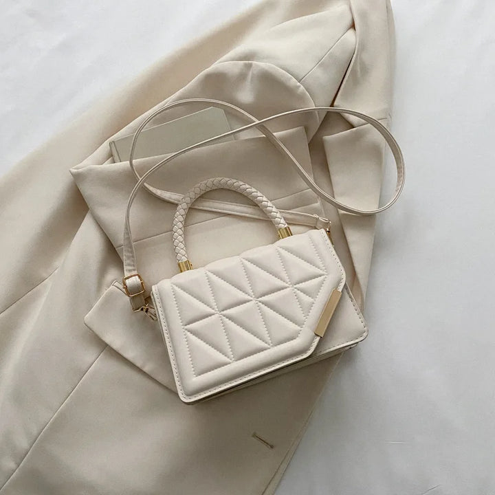 Sac bandoulière matelassé femme rabat asymétrique bandoulière réglable