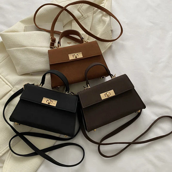 Sac satchel femme structuré fermoir twist-lock bandoulière amovible