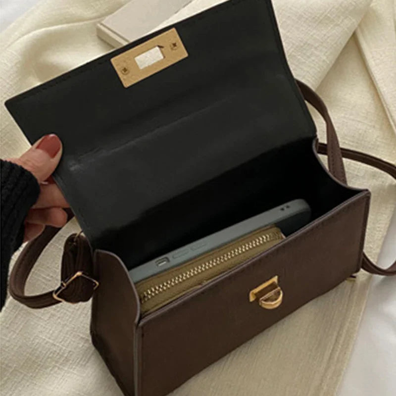 Sac satchel femme structuré fermoir twist-lock bandoulière amovible