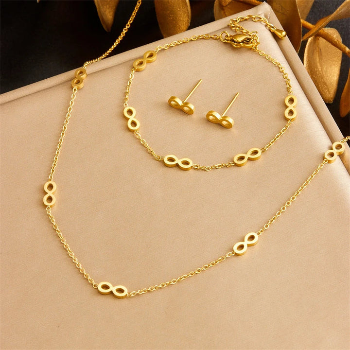 Parure bijoux femme infini doré collier et boucles assorties élégantes