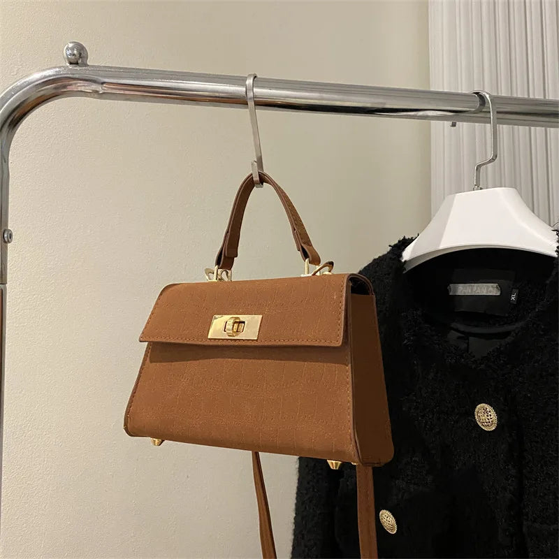 Sac satchel femme structuré fermoir twist-lock bandoulière amovible