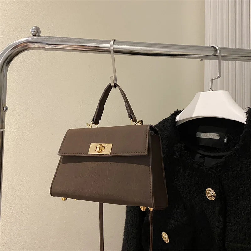 Sac satchel femme structuré fermoir twist-lock bandoulière amovible