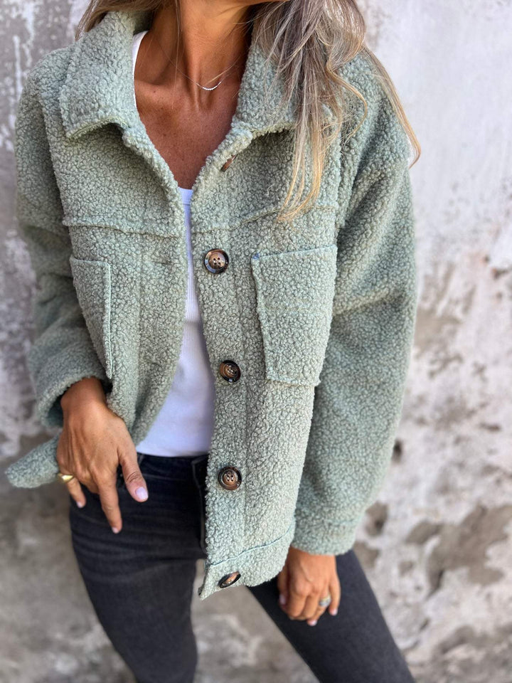 Veste mi-longue femme coupe droite col à revers chaude et élégante