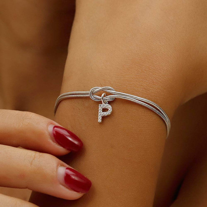 Bracelet initiale femme cuivre doré personnalisable design noué élégant
