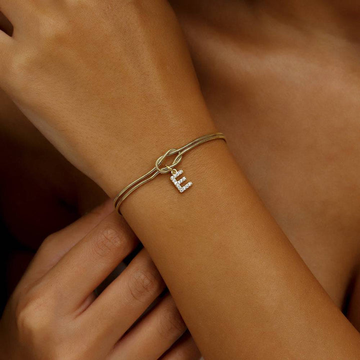 Bracelet initiale femme cuivre doré personnalisable design noué élégant