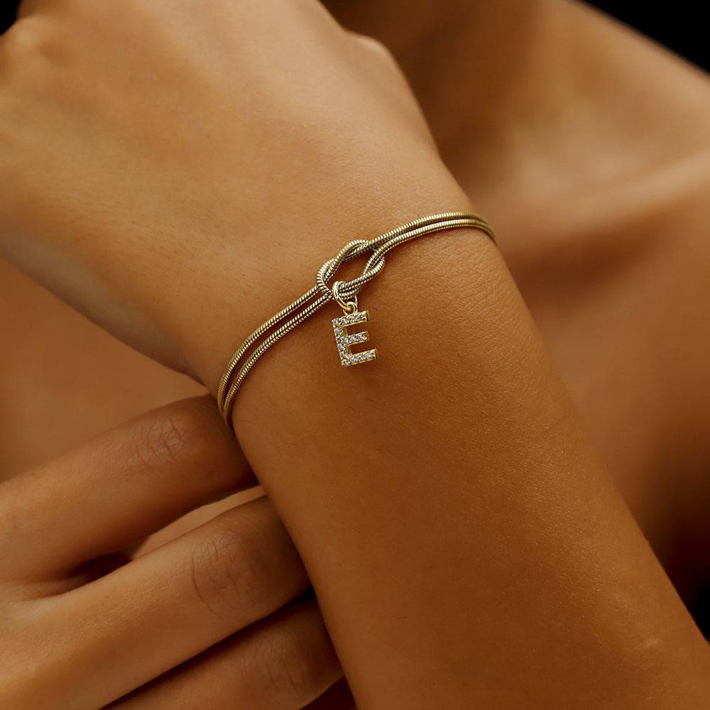 Bracelet initiale femme cuivre doré personnalisable design noué élégant