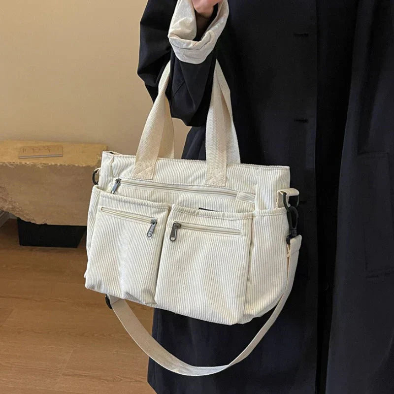 Sac à main femme double fermeture zippée compartiments spacieux élégant